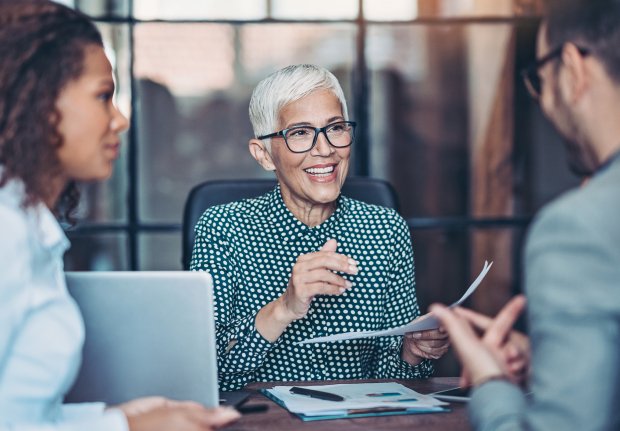 Group of business person in discussion in the office